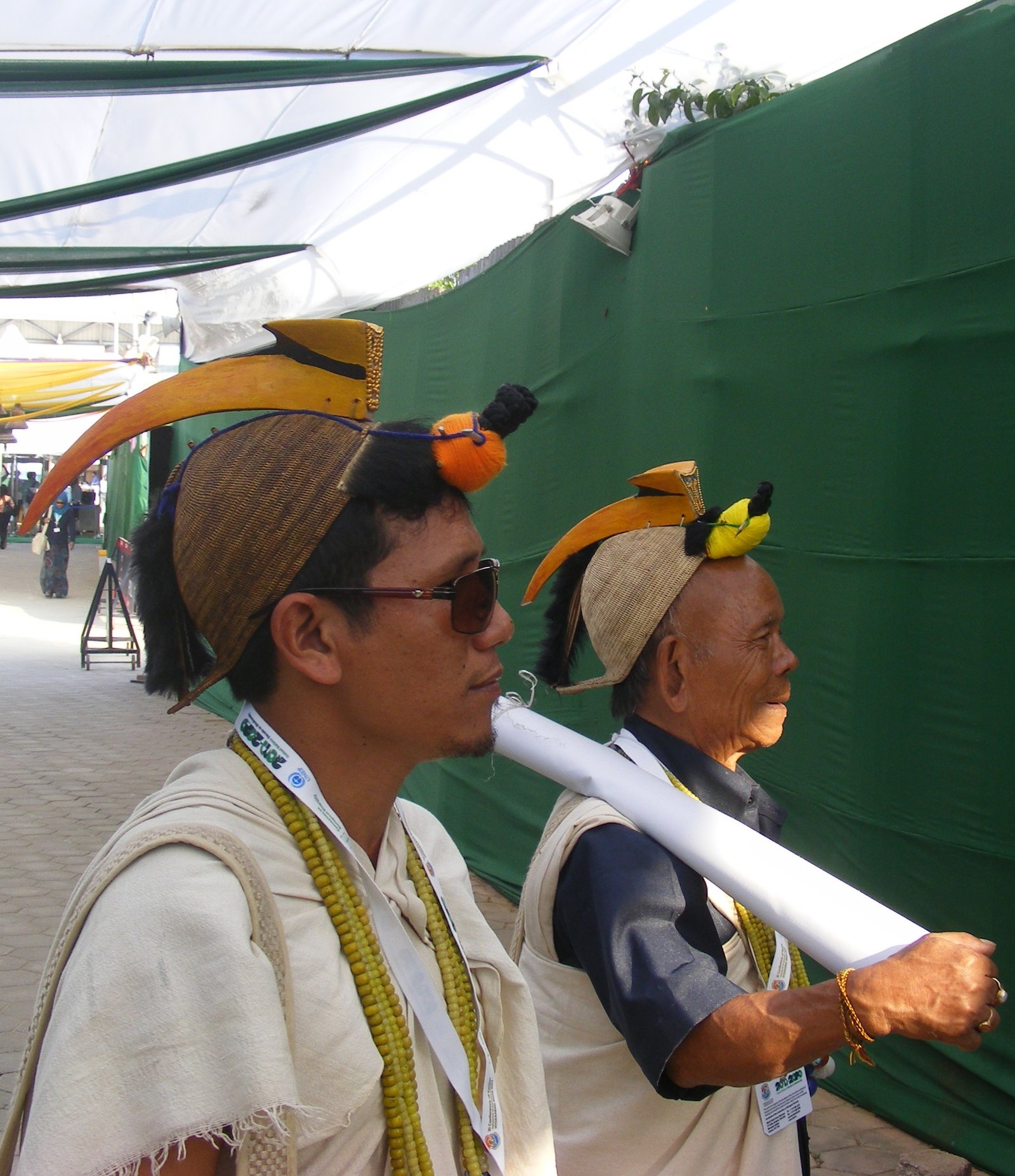 Nyishi tribesman from Arunachal Pradesh wearing traditional hornbill-beak headdress
