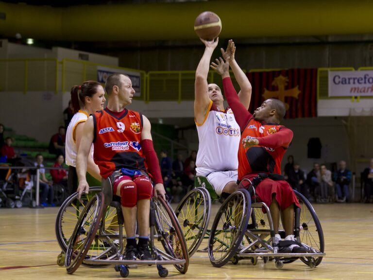 Wheelchair basketball players contest a rebound during a Euroleague match, file photo